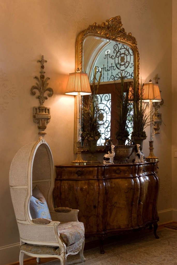 Skinny lamps on the ends of this chest add balance and do not overwhelm the space.